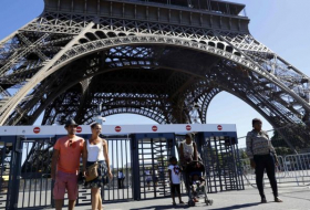 Paris unveils glass wall to protect Eiffel Tower
